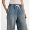 YAYA - Džínsové nohavice so širokými nohavicami a šnúrkou v páse - mid blue denim